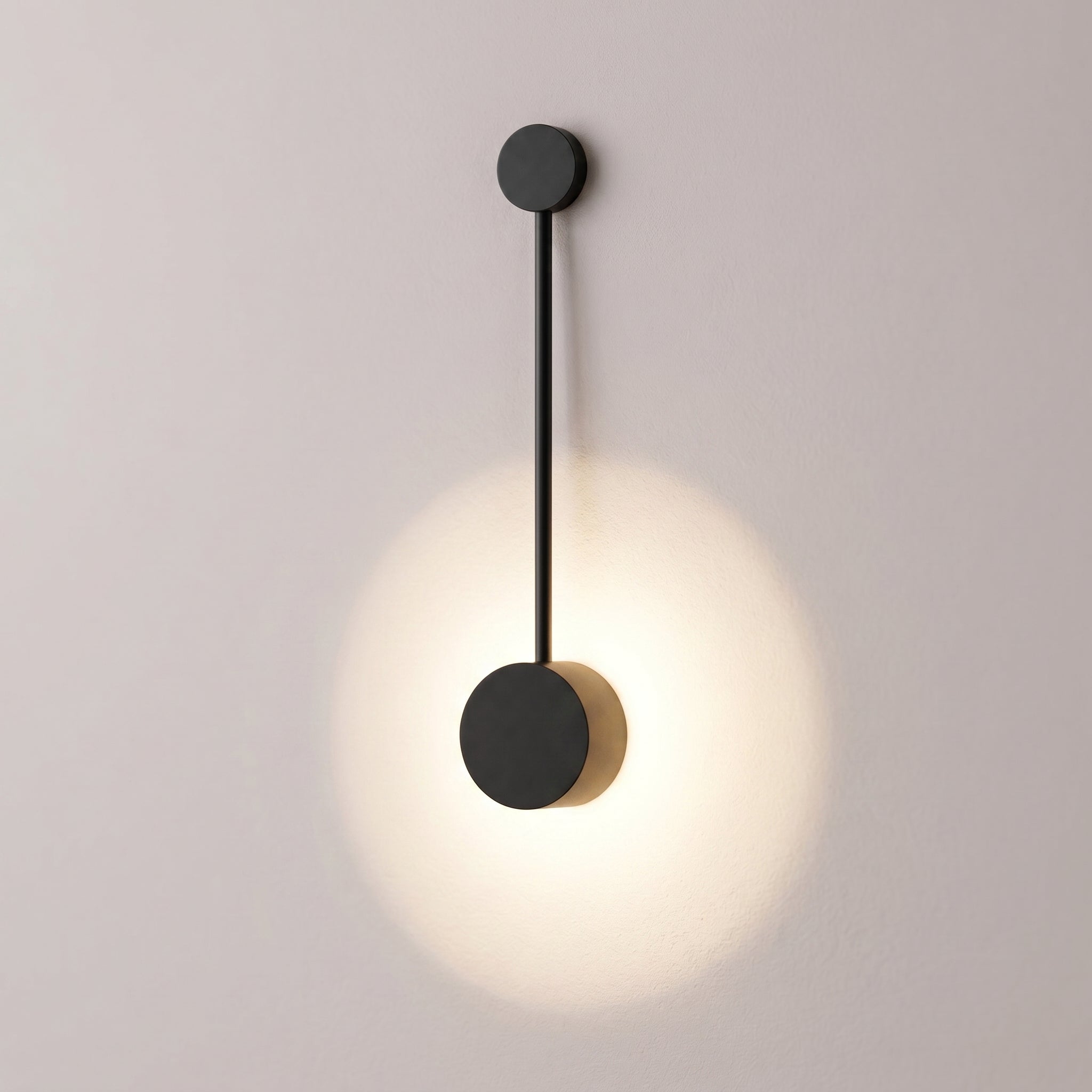 Riflesso wall lamp detail, drum facing the wall with a round reflected glow