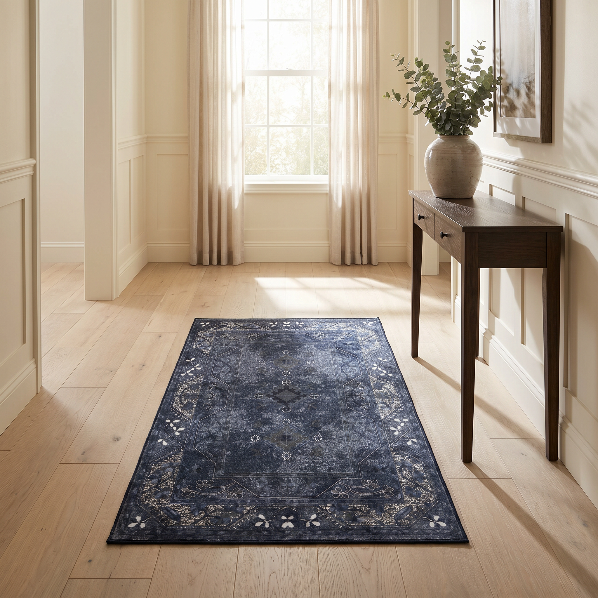 Zaffiro navy Persian rug in a bright entryway