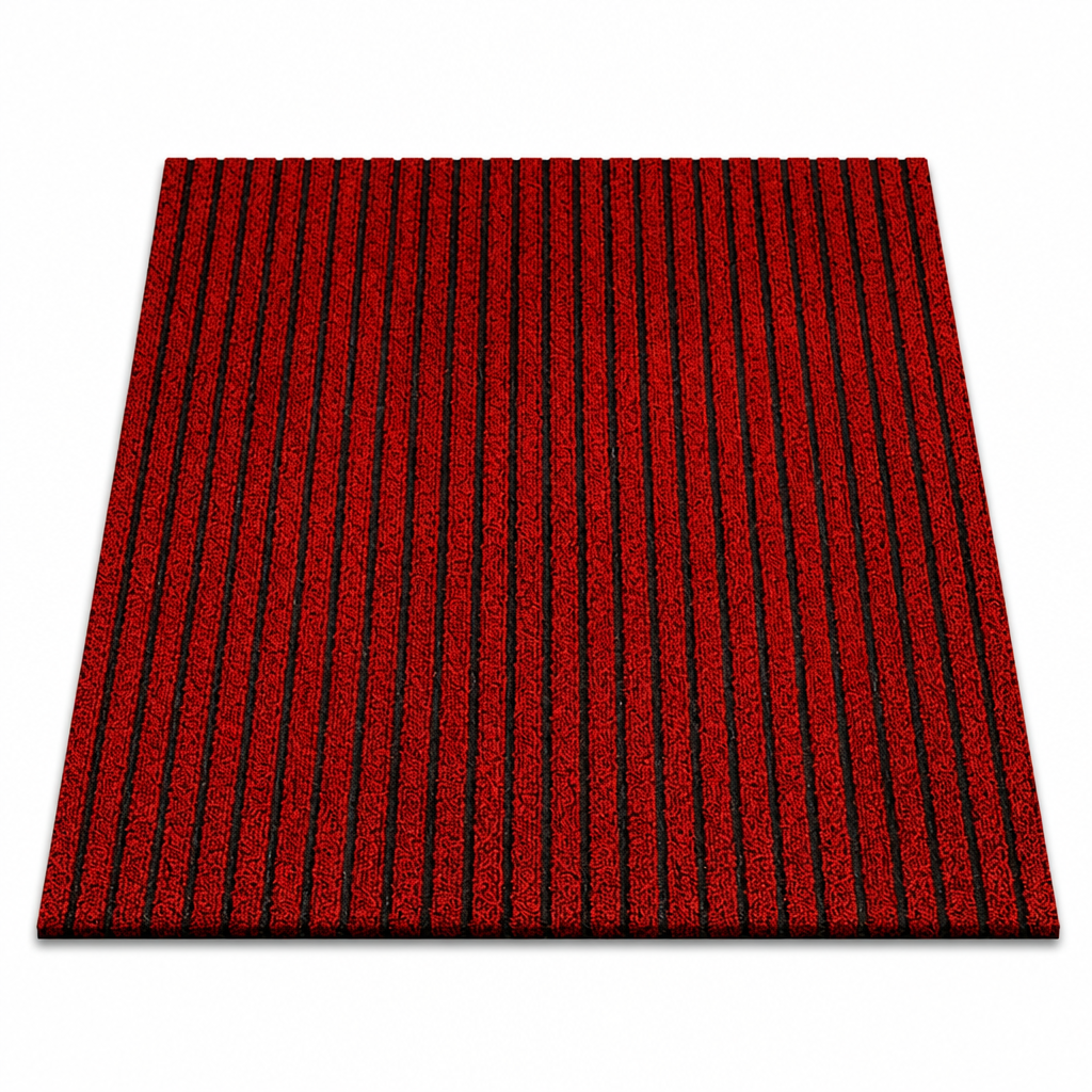 Red ribbed non-slip doormat, studio white background