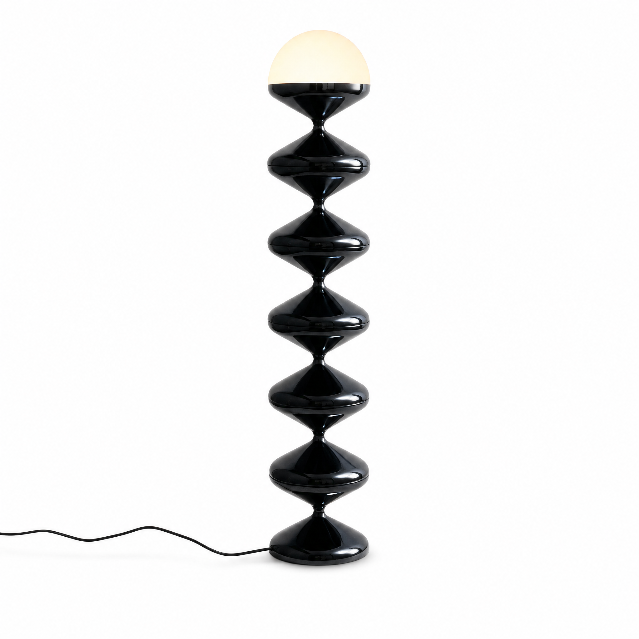 Onda Verticale sculptural floor lamp in Black, stacked faceted discs and frosted dome, studio