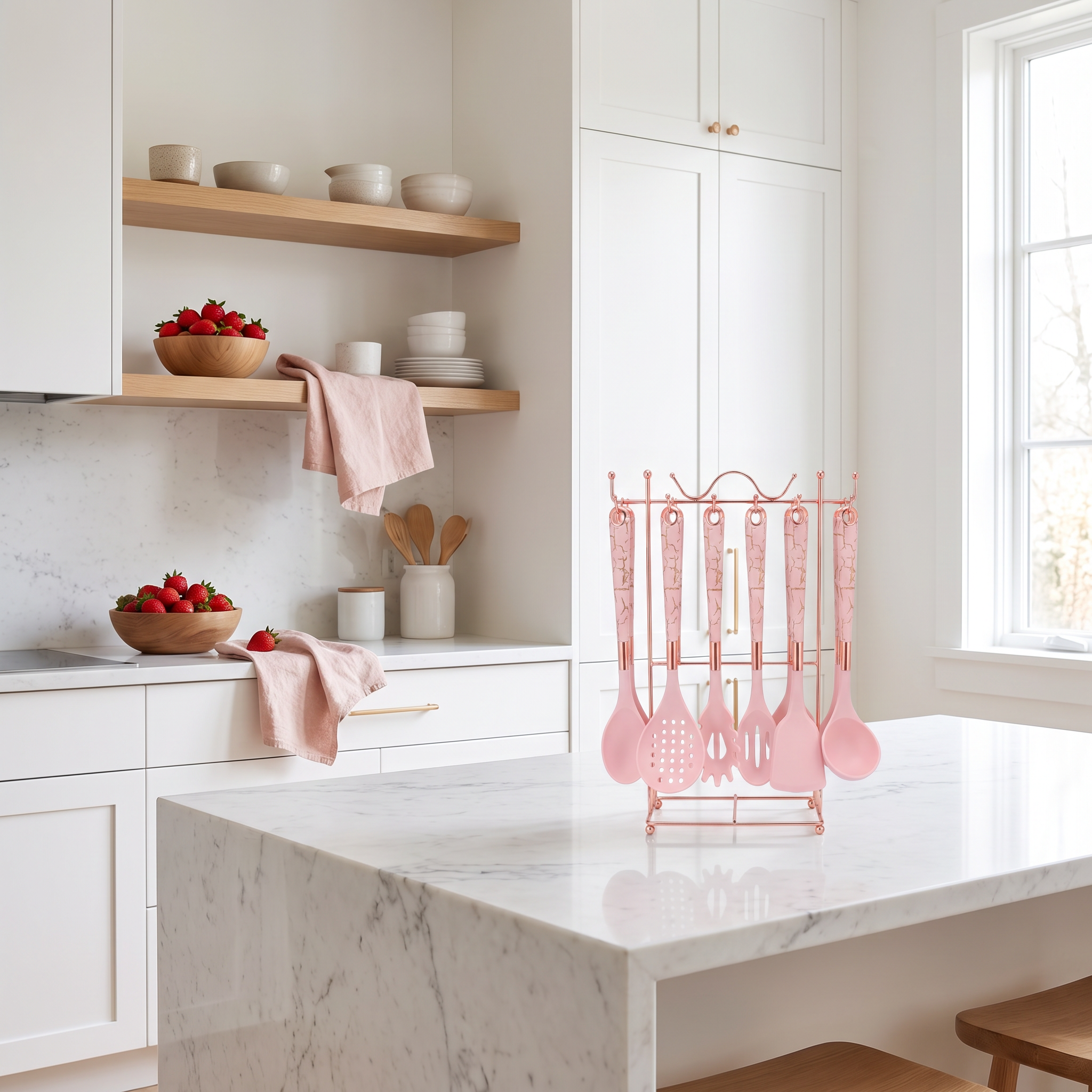 Blush pink Marmo utensil set on its rose-gold stand in a bright Scandinavian kitchen