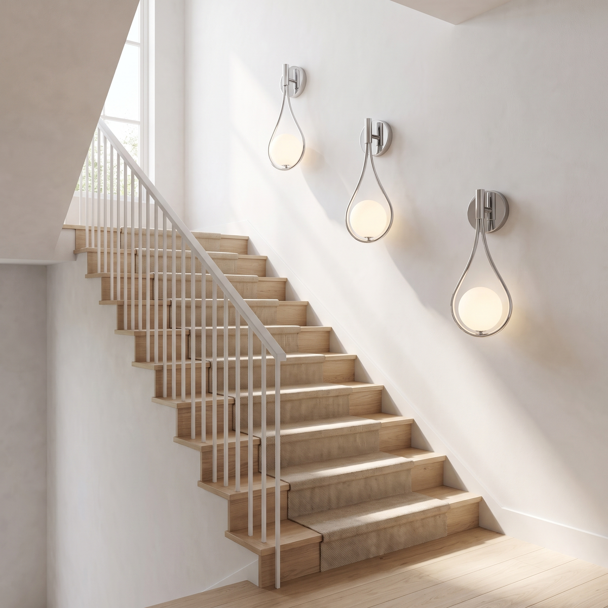 Silver opal globe wall sconces stepping up a bright staircase wall