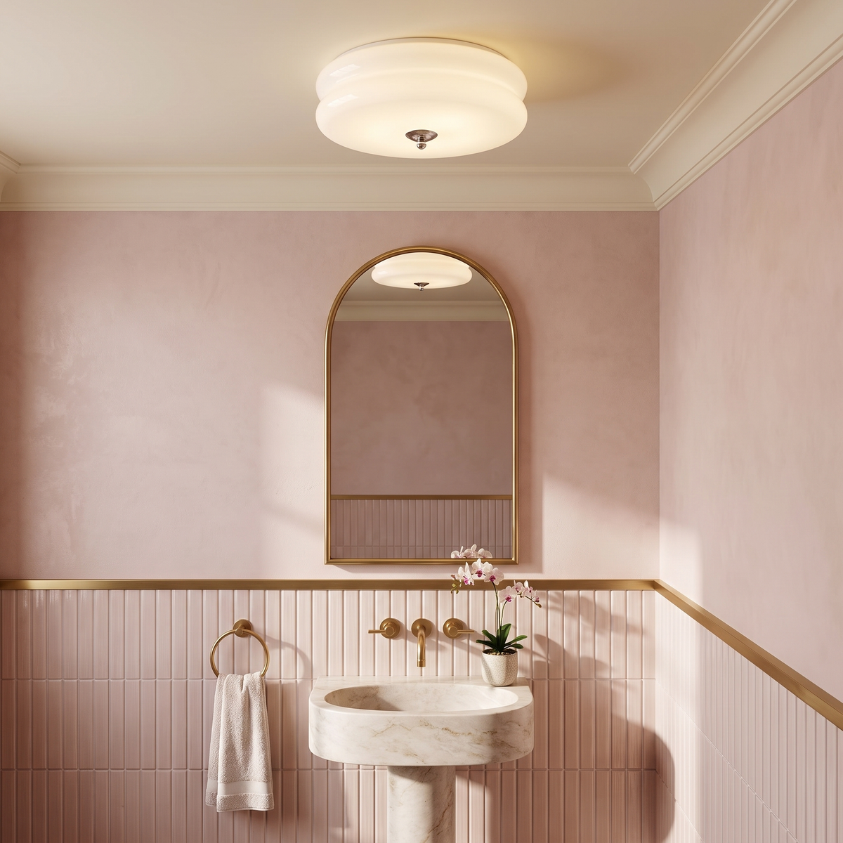 White ribbed glass flush mount light in a pink powder room