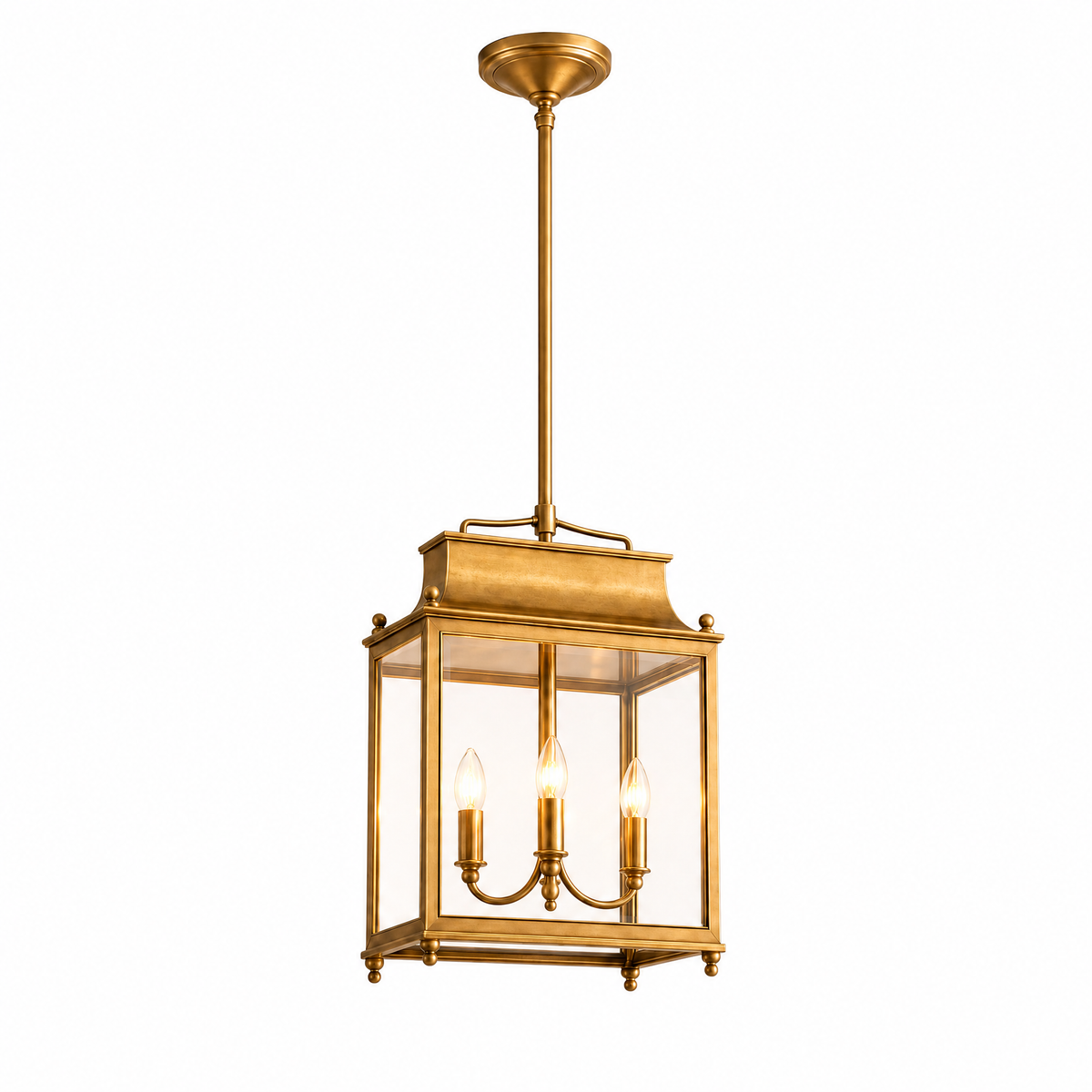 Villa Serale glass lantern pendant light in Vintage Brass, lit, on white