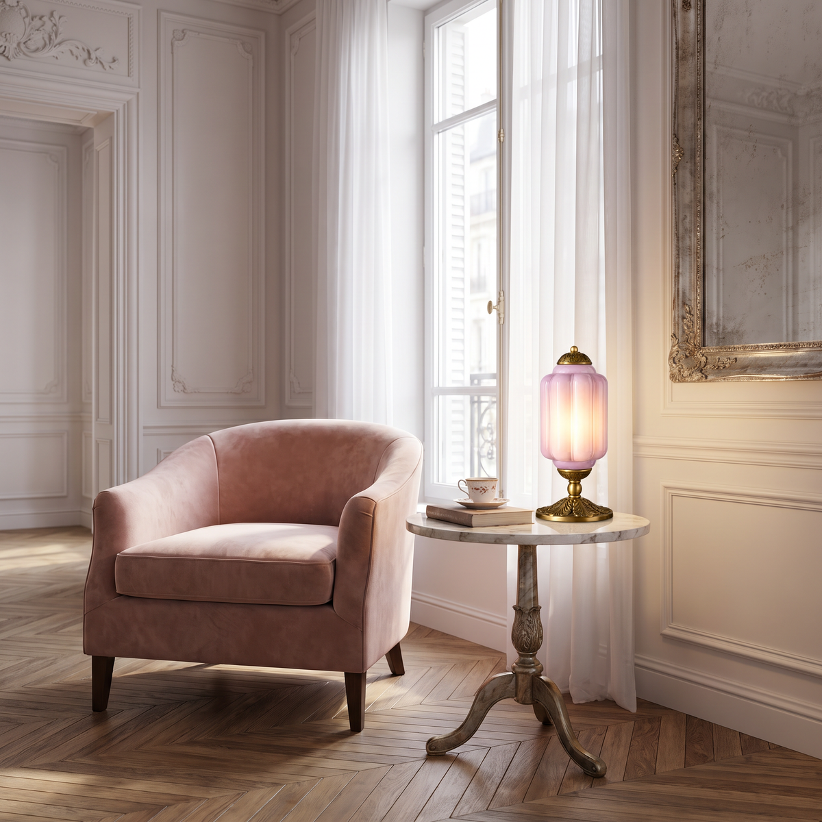 Lavender glass table lamp on a marble side table beside a blush armchair
