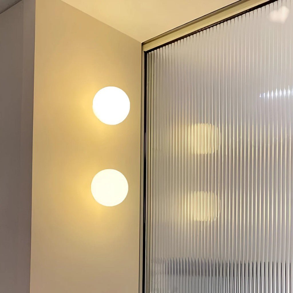 https://cdn.shopify.com/s/files/1/0655/0464/1076/files/japandi-minimalist-spherical-glass-wall-light-sconces_7.jpg?v=1773242587
