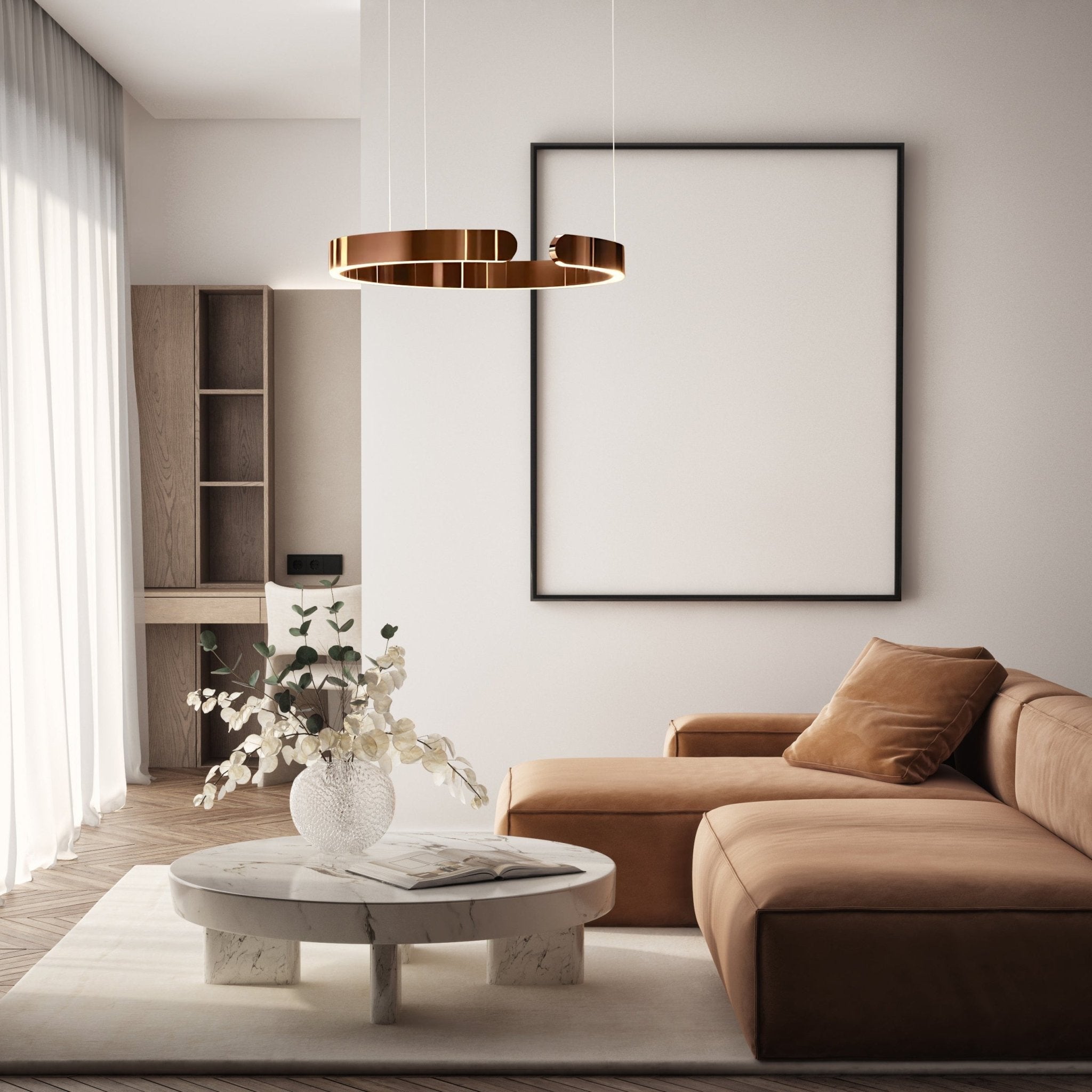 Rose Gold Orbita LED Ring Chandelier above a sofa