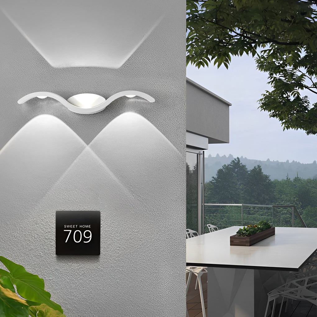 https://cdn.shopify.com/s/files/1/0556/5382/6742/files/outdoor-seagull-wall-lighting-outdoor-scenes.jpg?v=1767081424