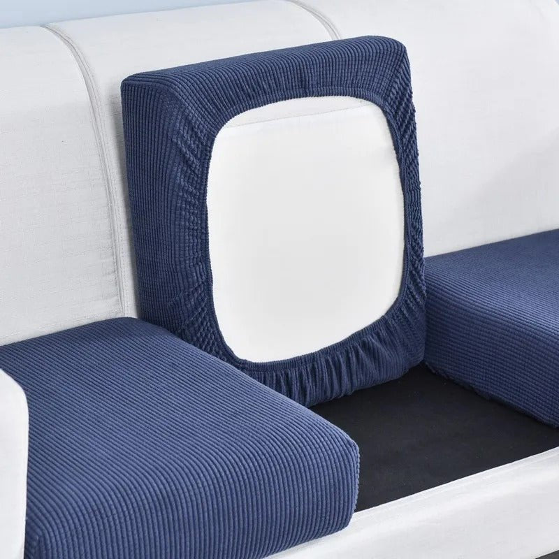 https://cdn.shopify.com/s/files/1/0655/0464/1076/files/pet-friendly-stretch-sofa-cover-washable-furniture-protector-604786.jpg?v=1750730671