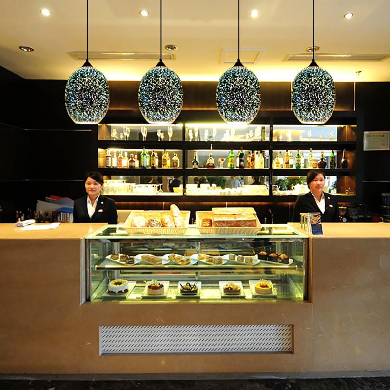 Notte Stellata pendants over a cafe bar