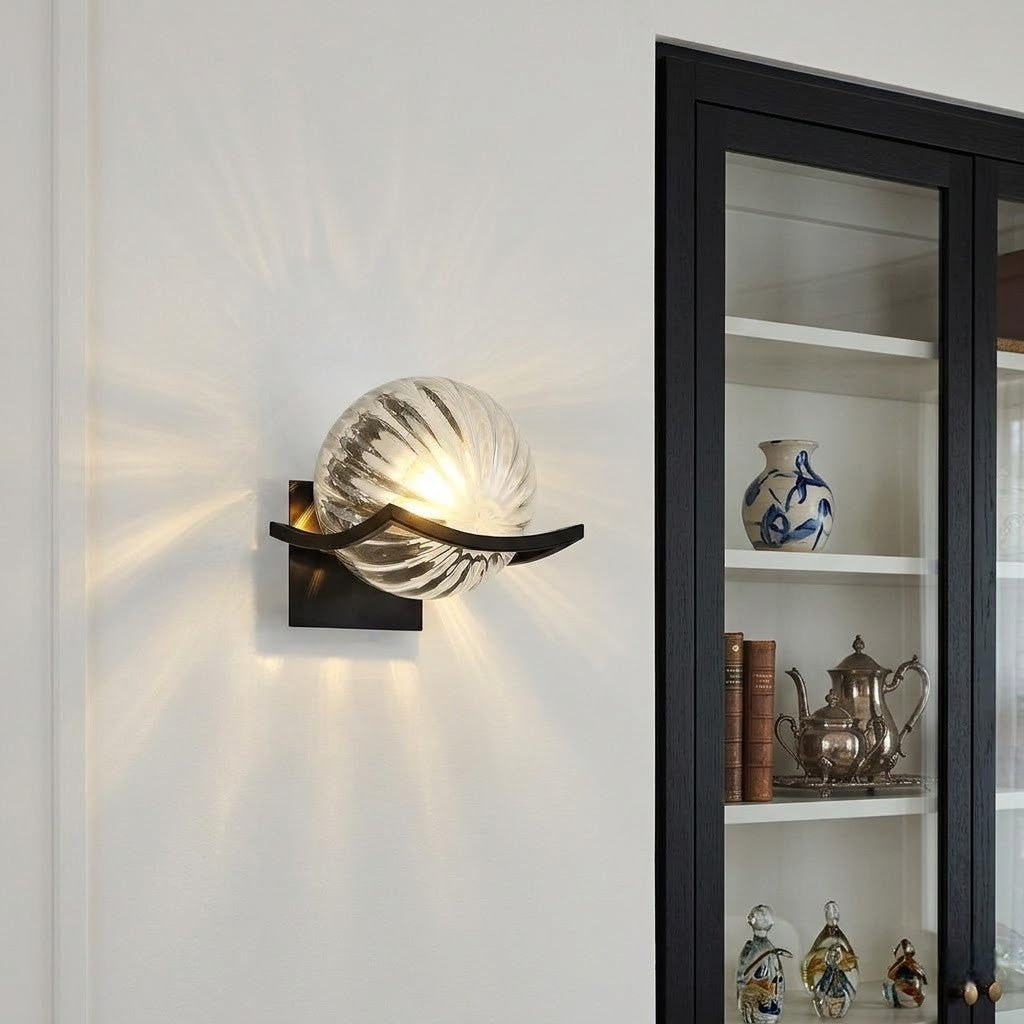 https://cdn.shopify.com/s/files/1/0655/0464/1076/files/sirius-glass-globe-wall-sconce-with-black-finish-3357901.jpg?v=1774455615