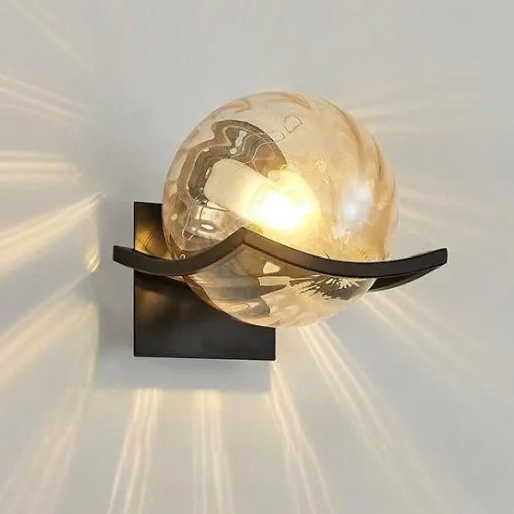 https://cdn.shopify.com/s/files/1/0655/0464/1076/files/sirius-glass-globe-wall-sconce-with-black-finish-5511103.jpg?v=1774455666