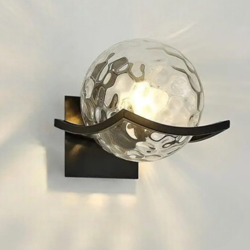 https://cdn.shopify.com/s/files/1/0655/0464/1076/files/sirius-glass-globe-wall-sconce-with-black-finish-7887398.jpg?v=1774455615