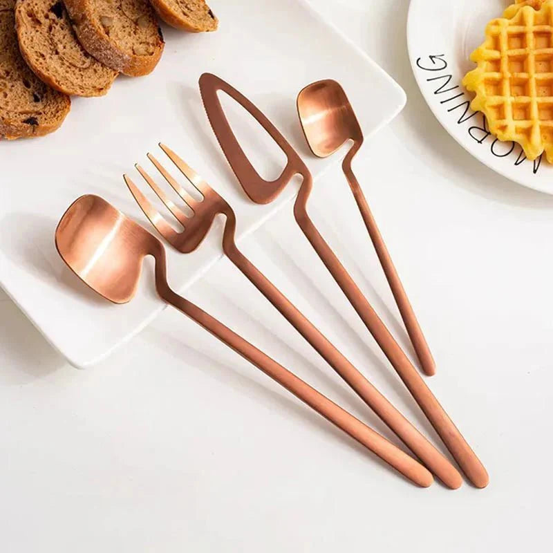 https://cdn.shopify.com/s/files/1/0655/0464/1076/files/skeleton-cutlery-set-luxe-stainless-steel-with-bold-contemporary-design-446310.webp?v=1773243366
