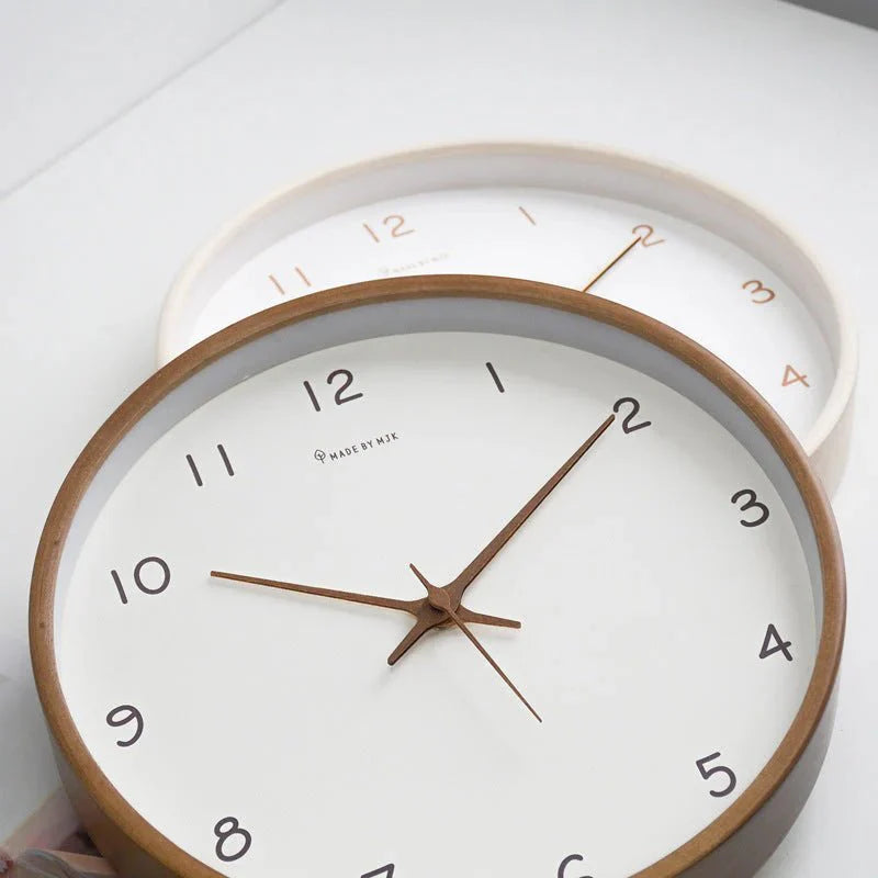 https://cdn.shopify.com/s/files/1/0655/0464/1076/files/timelesswood-solid-wood-analog-wall-clock-with-minimalist-design-215979.webp?v=1773243192