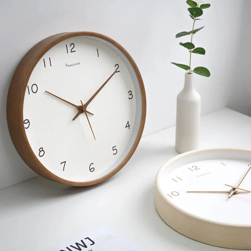 https://cdn.shopify.com/s/files/1/0655/0464/1076/files/timelesswood-solid-wood-analog-wall-clock-with-minimalist-design-792401.webp?v=1773243192