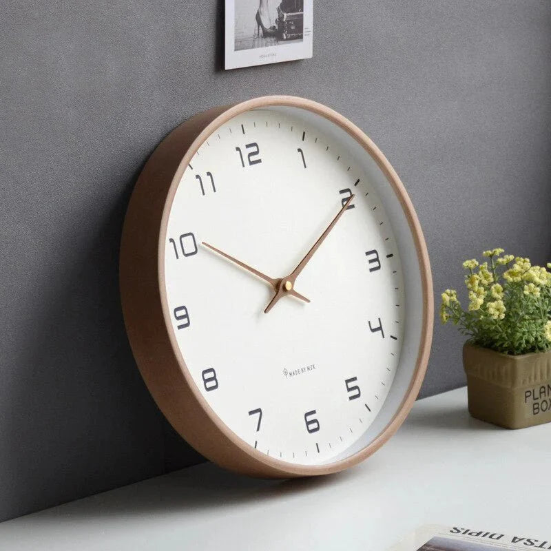 https://cdn.shopify.com/s/files/1/0655/0464/1076/files/wooden-wall-clock-scandinavian-minimalist-design-color-brown-detais.webp?v=1773876100