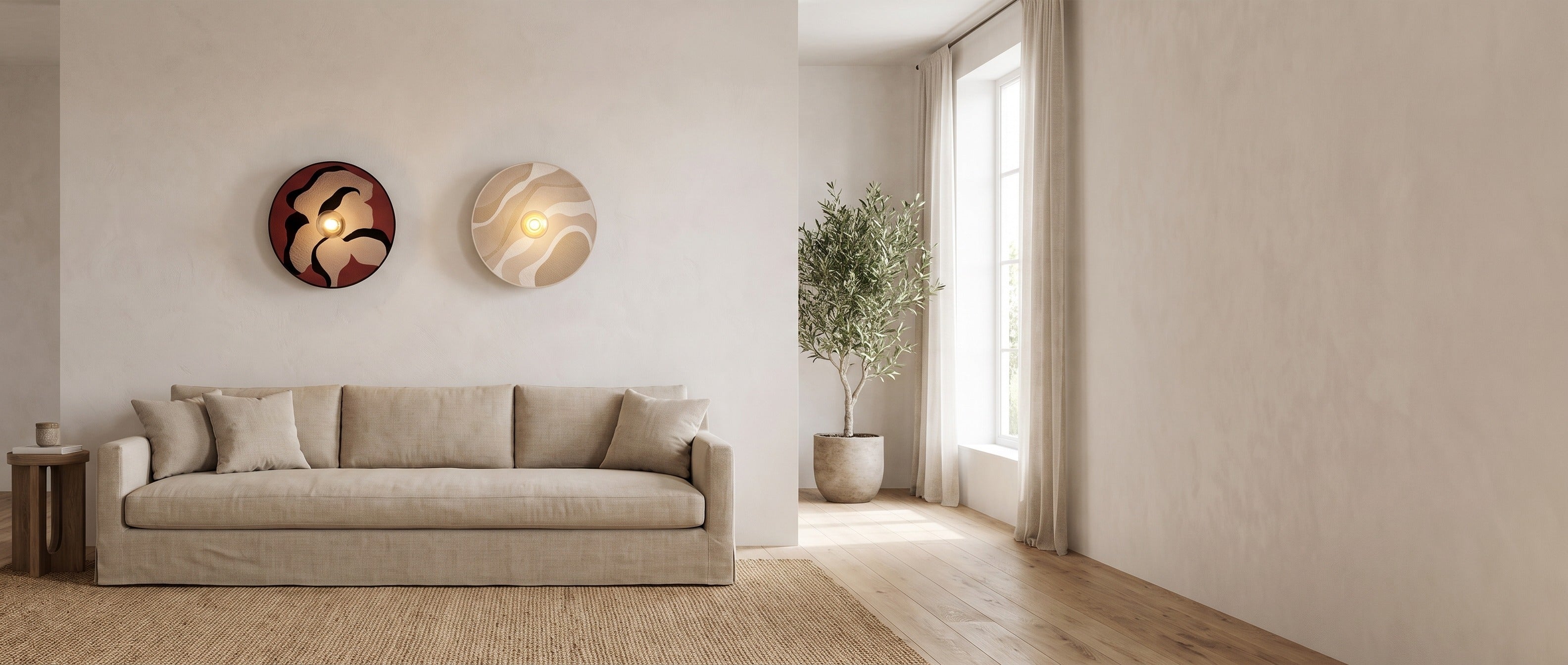 Luna Tessuta textile disc wall sconces in Bordeaux Bloom and Sand Waves above a linen sofa