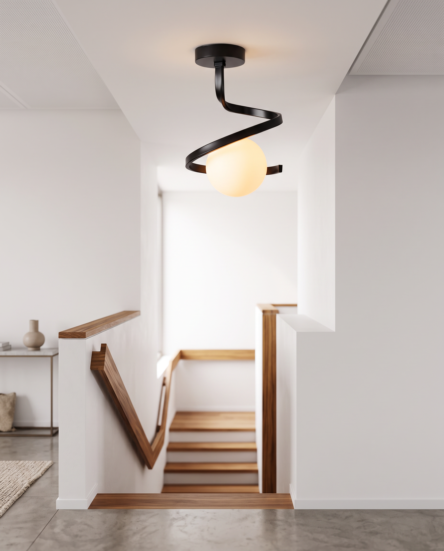 Spirale Lunare ceiling lamp above a staircase landing