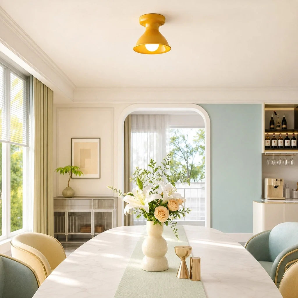 Chamomile yellow ceramic flush mount ceiling light above a bright dining room