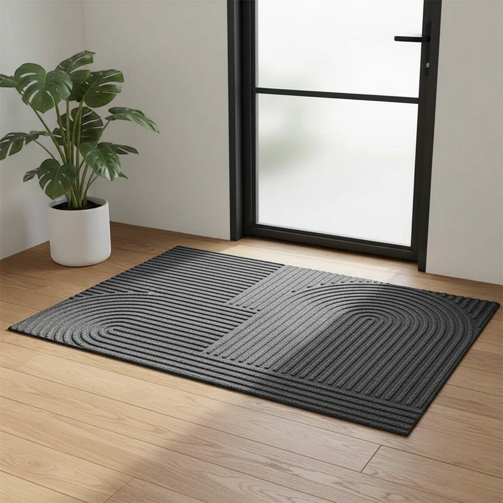 https://cdn.shopify.com/s/files/1/0655/0464/1076/files/3d-grooved-geometric-doormat-anti-slip-scraper-entrance-mat-1253748.jpg?v=1779807017