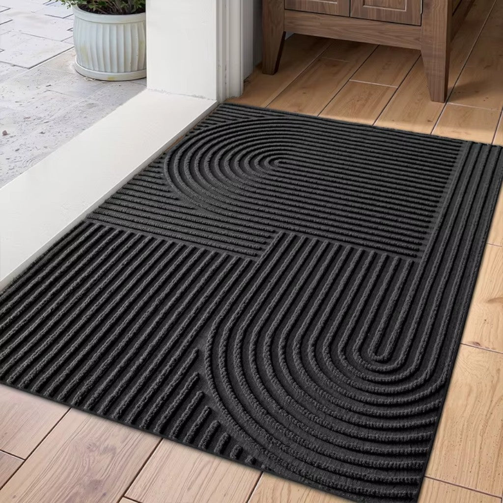 https://cdn.shopify.com/s/files/1/0655/0464/1076/files/3d-grooved-geometric-doormat-anti-slip-scraper-entrance-mat-3653782.jpg?v=1779807074