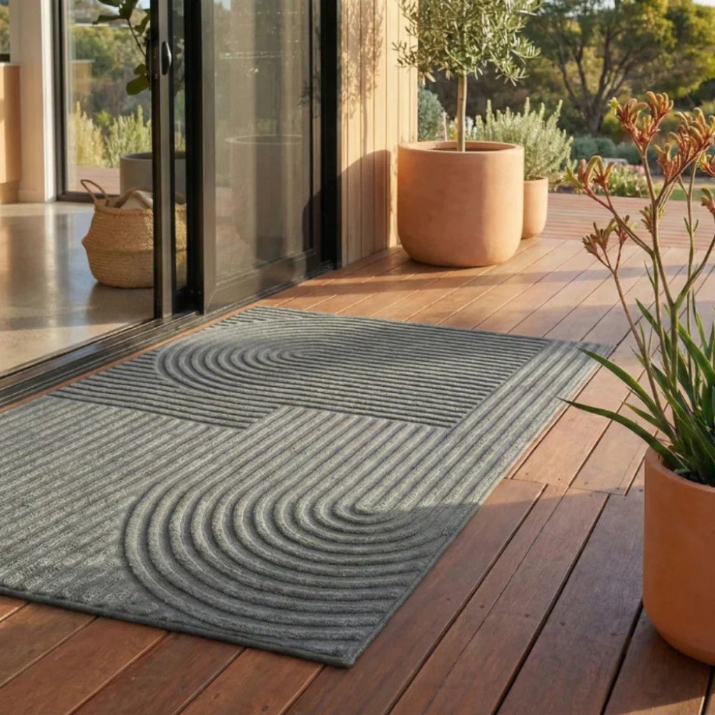 https://cdn.shopify.com/s/files/1/0655/0464/1076/files/3d-grooved-geometric-doormat-anti-slip-scraper-entrance-mat-3908660.jpg?v=1779807017