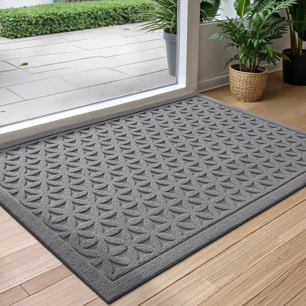 https://cdn.shopify.com/s/files/1/0655/0464/1076/files/3d-grooved-geometric-doormat-anti-slip-scraper-entrance-mat-5223383.jpg?v=1779807074