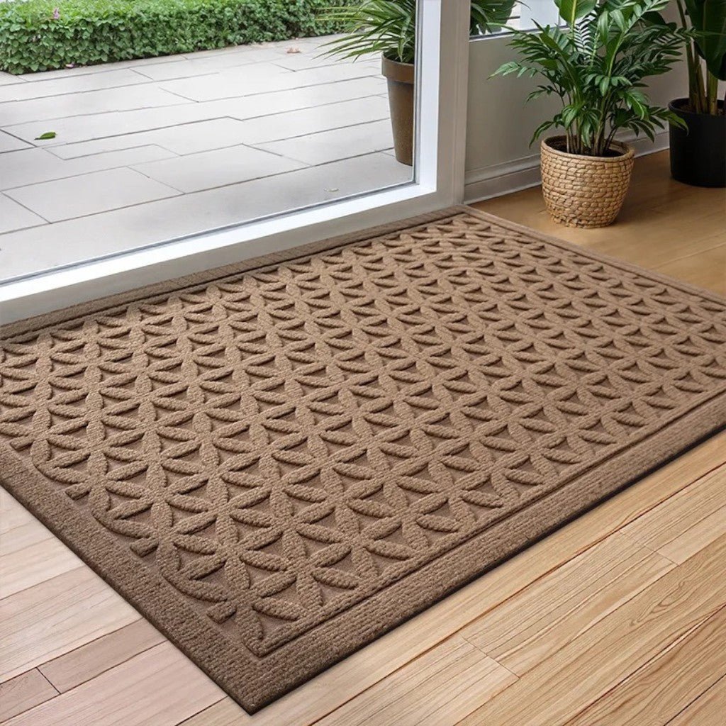 https://cdn.shopify.com/s/files/1/0655/0464/1076/files/3d-grooved-geometric-doormat-anti-slip-scraper-entrance-mat-6525717.jpg?v=1779807019