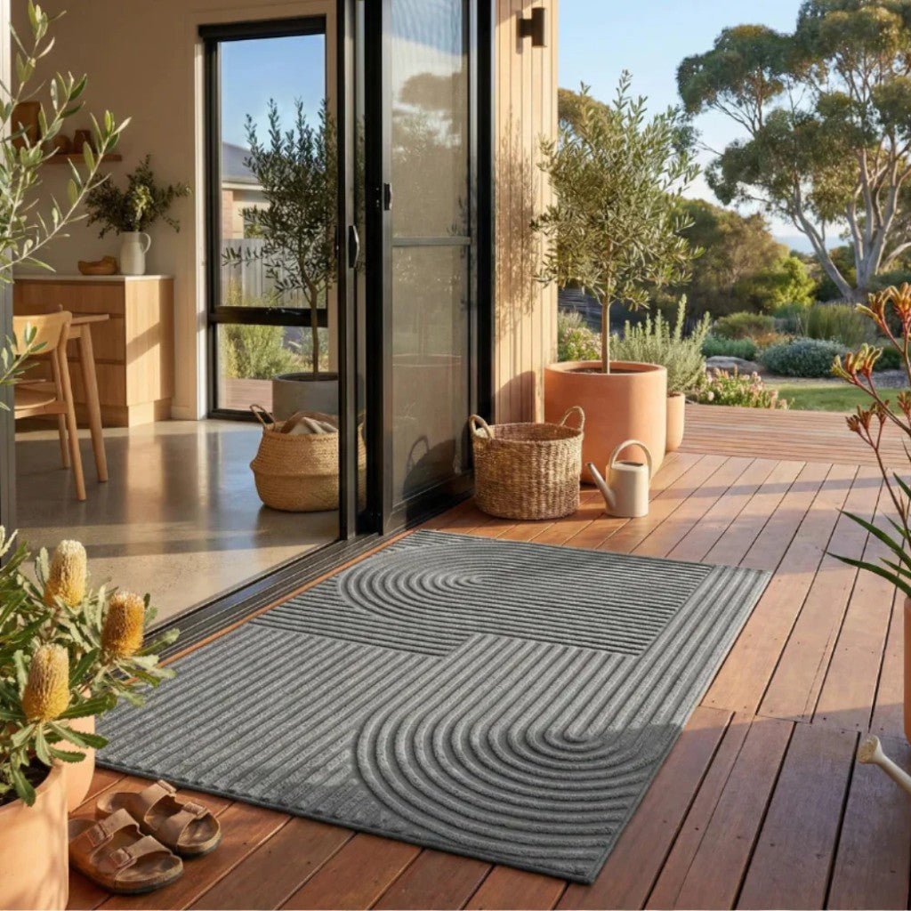 https://cdn.shopify.com/s/files/1/0655/0464/1076/files/3d-grooved-geometric-doormat-anti-slip-scraper-entrance-mat-7546497.jpg?v=1779807018