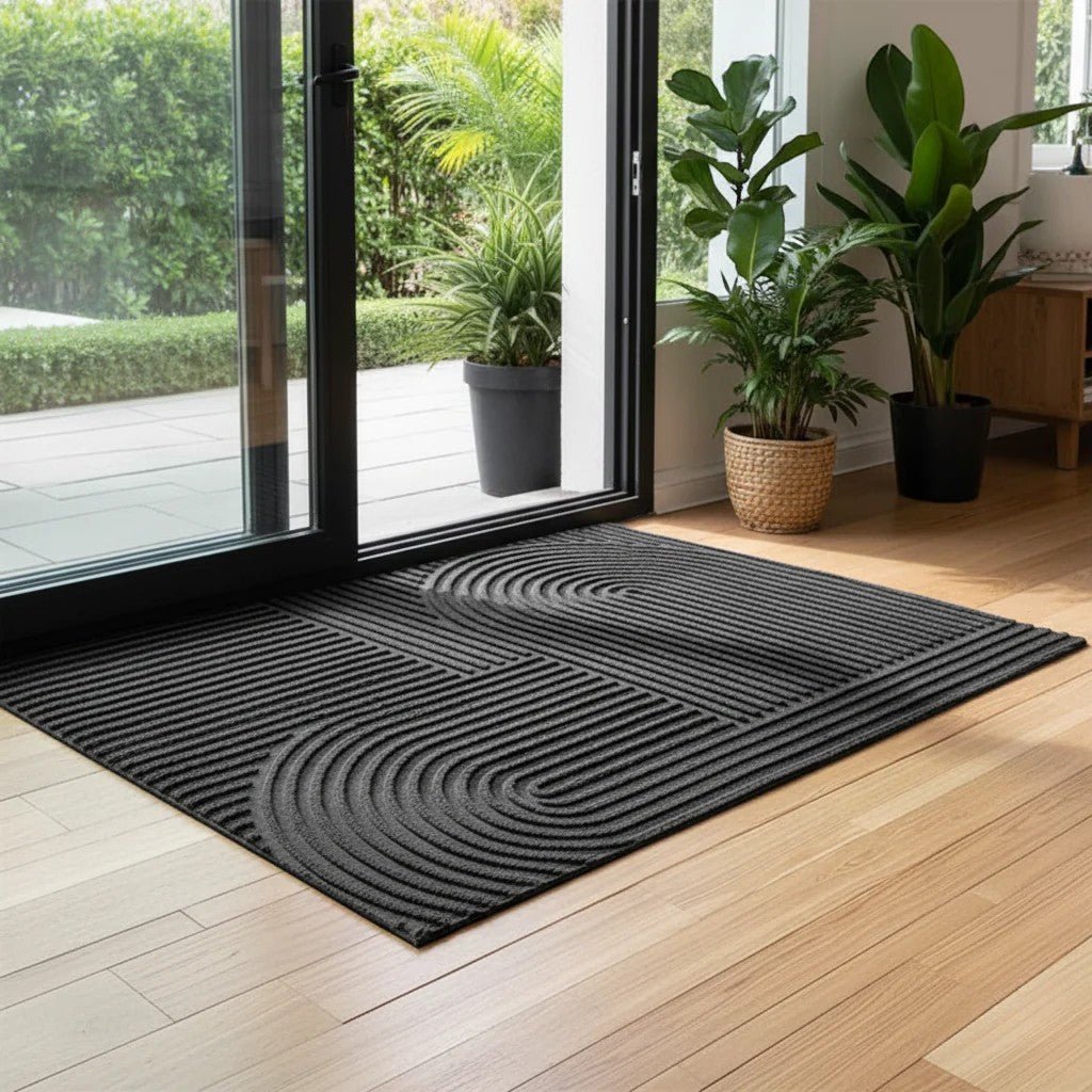 https://cdn.shopify.com/s/files/1/0655/0464/1076/files/3d-grooved-geometric-doormat-anti-slip-scraper-entrance-mat-7952224.jpg?v=1779807017