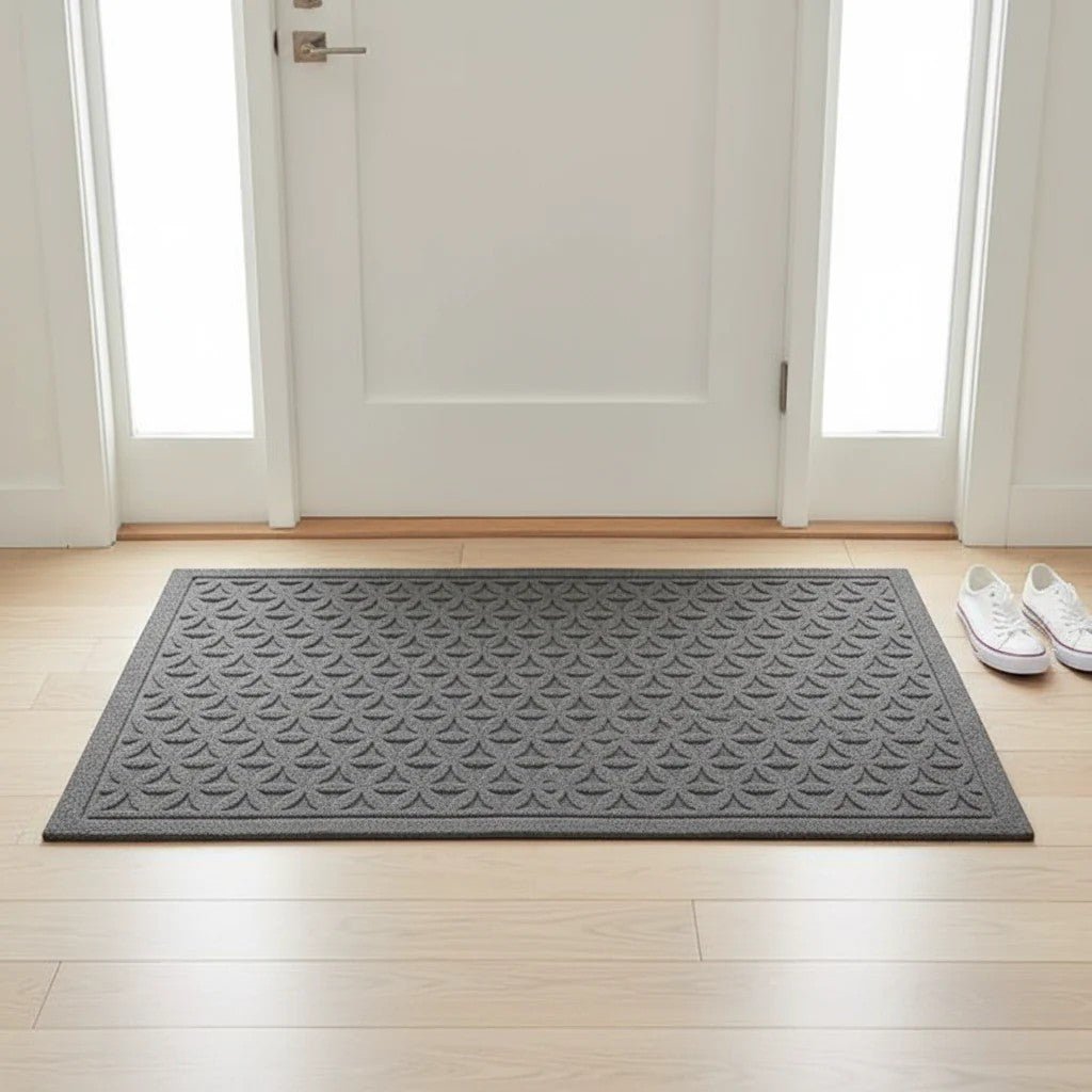 https://cdn.shopify.com/s/files/1/0655/0464/1076/files/3d-grooved-geometric-doormat-anti-slip-scraper-entrance-mat-9122689.jpg?v=1779807017