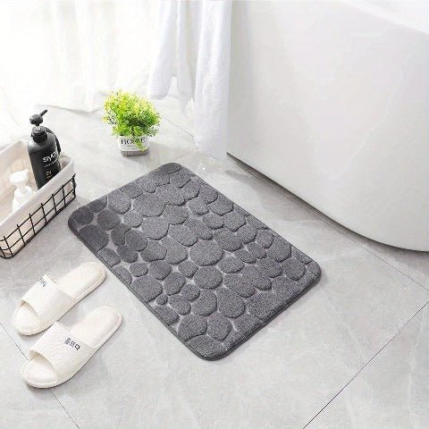 https://cdn.shopify.com/s/files/1/0655/0464/1076/files/3d-non-slip-bathroom-mat-with-quick-dry-absorbent-design-462149.jpg?v=1773243432