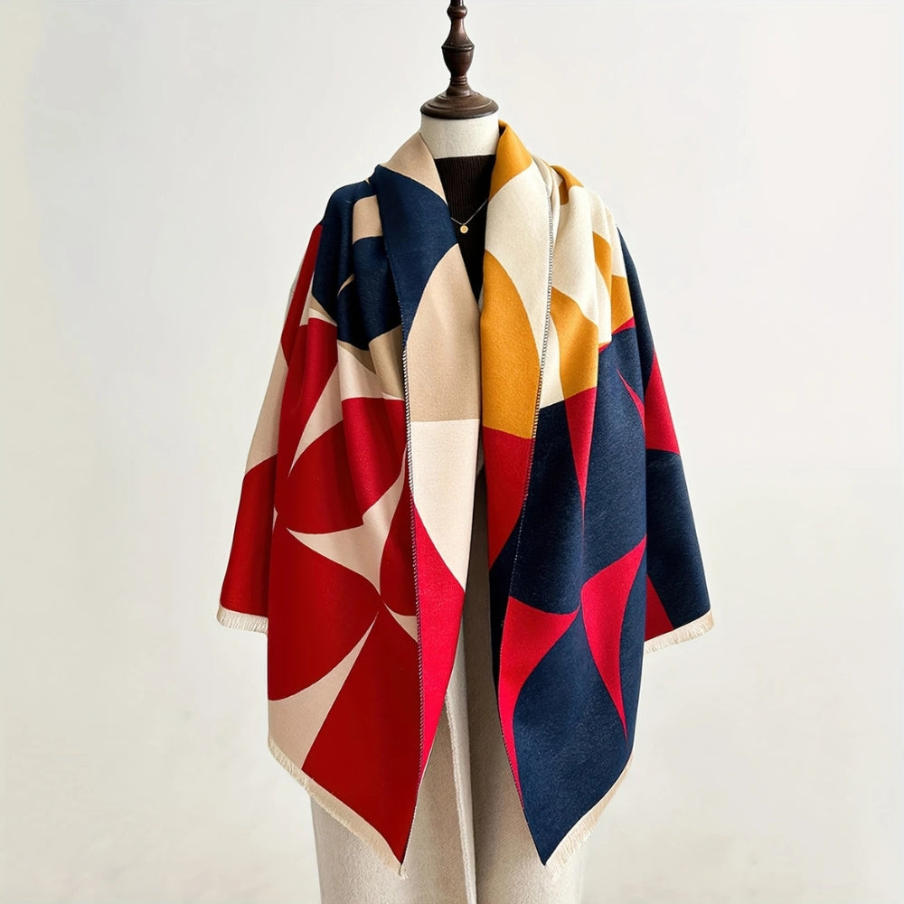 Woman wearing Cinnabar Navy reversible geometric wrap poncho