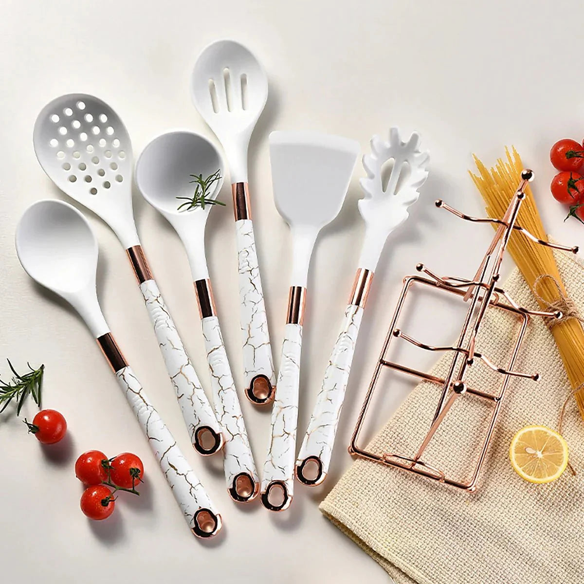 https://cdn.shopify.com/s/files/1/0655/0464/1076/files/7-piece-rose-gold-kitchen-utensil-set-with-stand-lattea-382108.webp?v=1750730550