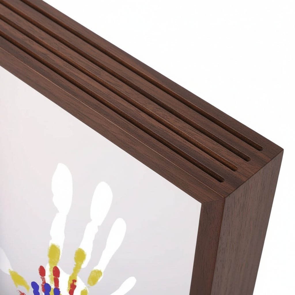 Close-up of the fluted brown wood frame edge