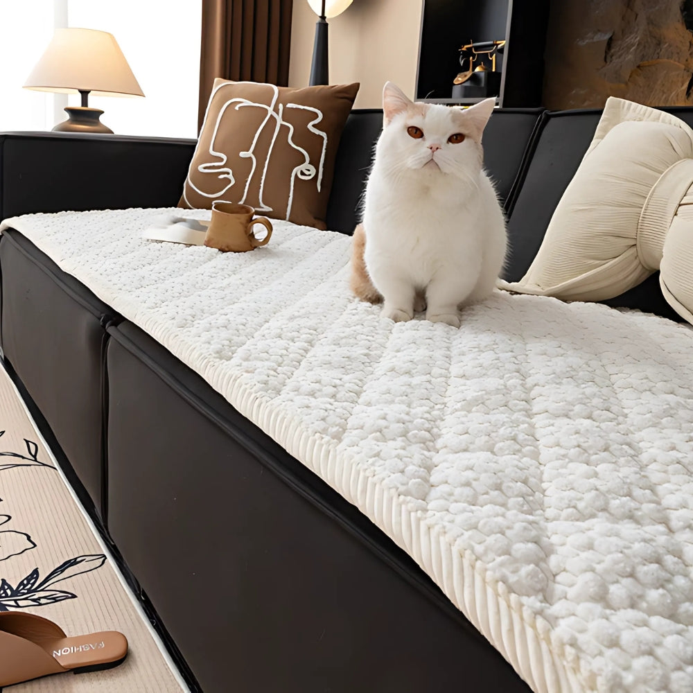 https://cdn.shopify.com/s/files/1/0637/4480/2863/files/Pet-ProofTexturedQuiltedSofaProtectorSlipcover_4.jpg?v=1755331398