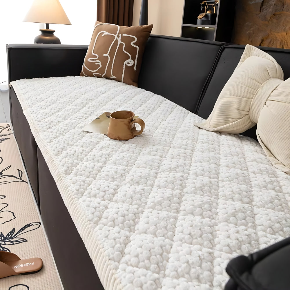 https://cdn.shopify.com/s/files/1/0637/4480/2863/files/Pet-ProofTexturedQuiltedSofaProtectorSlipcover_7.jpg?v=1755331398