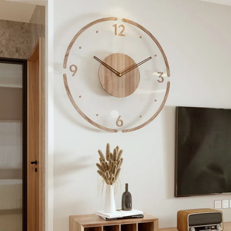 Scandinavian wooden wall clock on a living room wall above a console