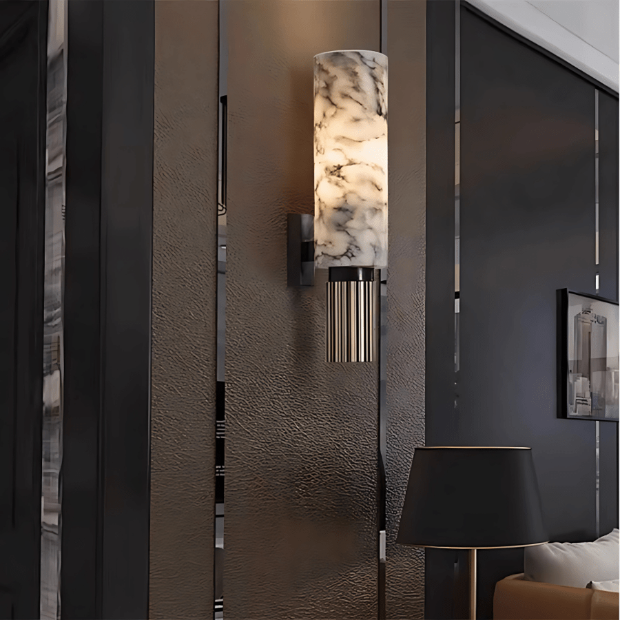 Aurora Marble Wall Sconce on a textured accent wall