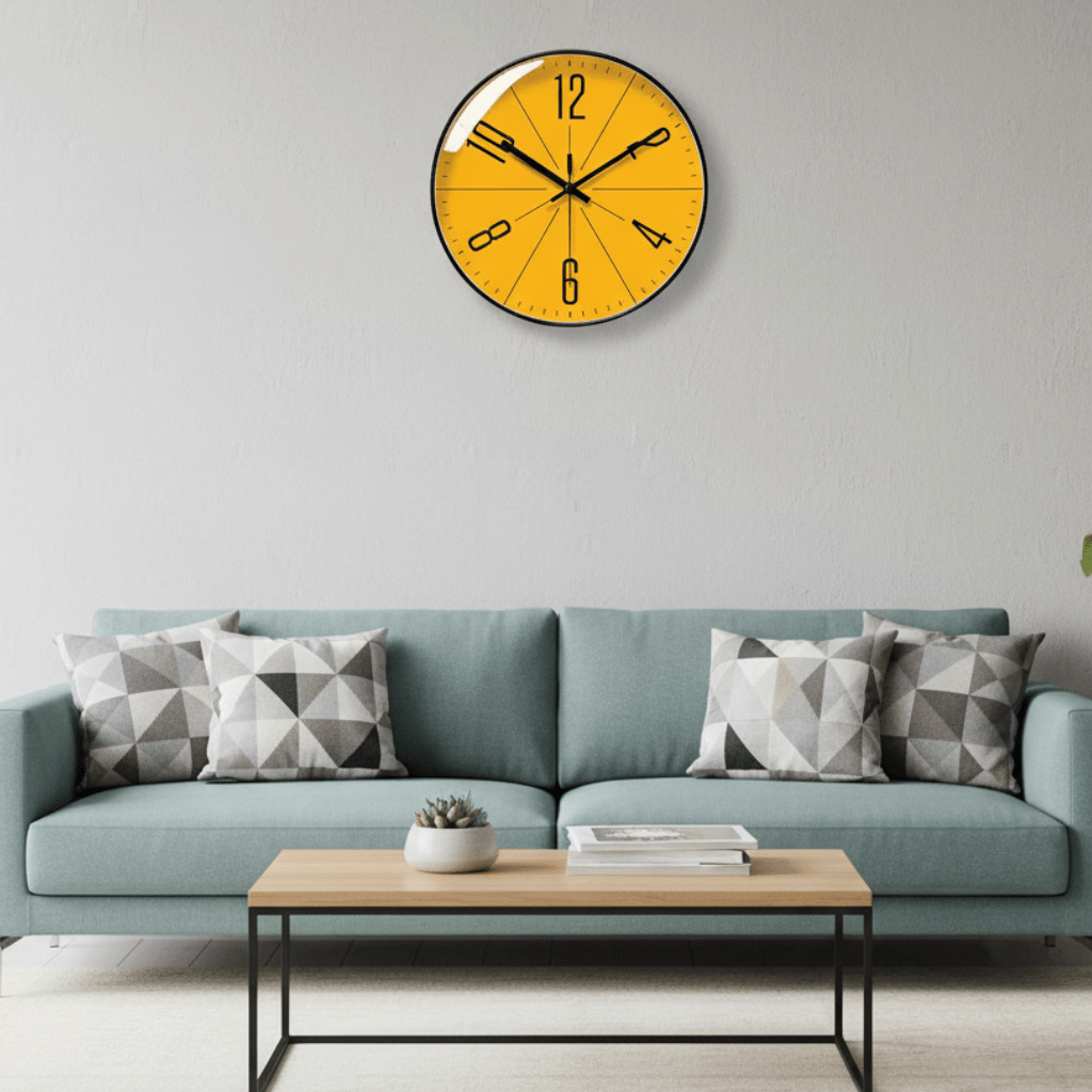 Orange Nordic wall clock above a teal sofa in a living room