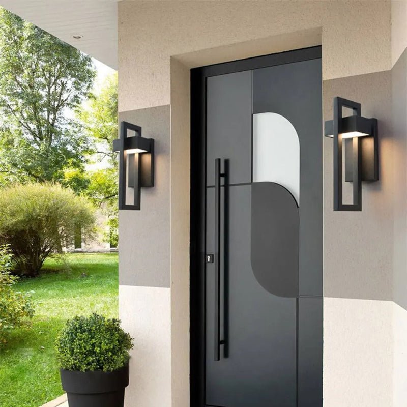 https://cdn.shopify.com/s/files/1/0655/0464/1076/files/black-up-down-outdoor-wall-light-211859.jpg?v=1773242651