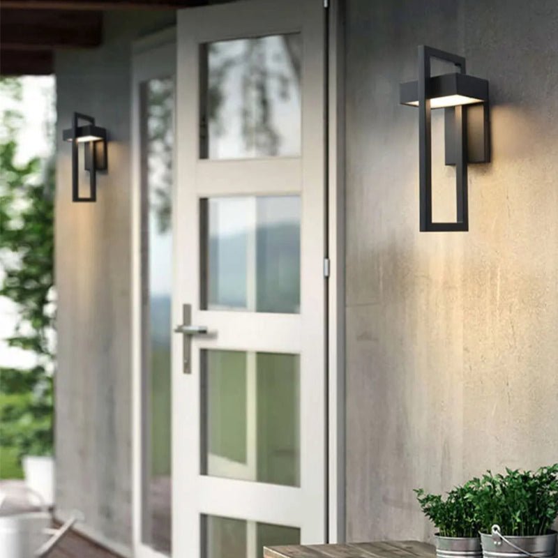 https://cdn.shopify.com/s/files/1/0655/0464/1076/files/black-up-down-outdoor-wall-light-313938.jpg?v=1773242651