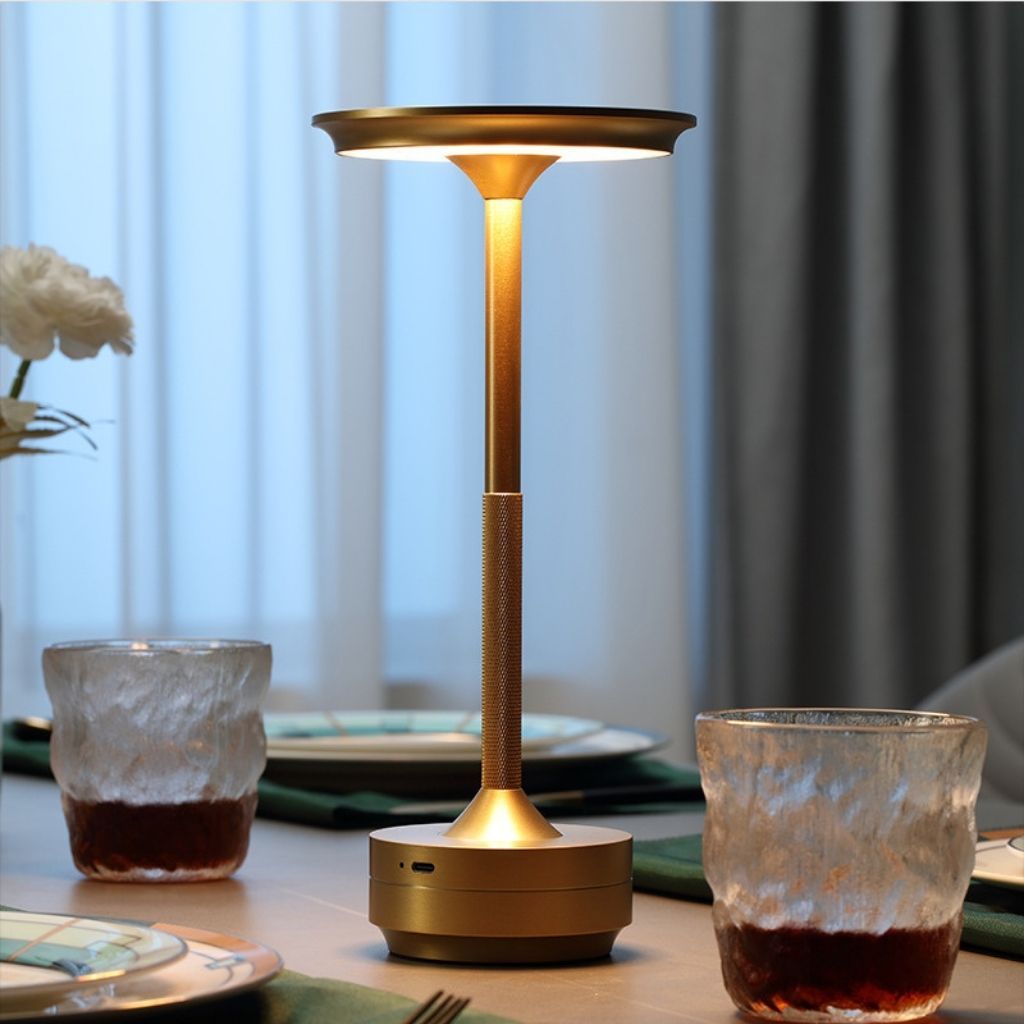 https://cdn.shopify.com/s/files/1/0655/0464/1076/files/cordless-table-lamp-3-mode-touch-sensitive-lattea-gold-on-the-table.jpg?v=1758222401