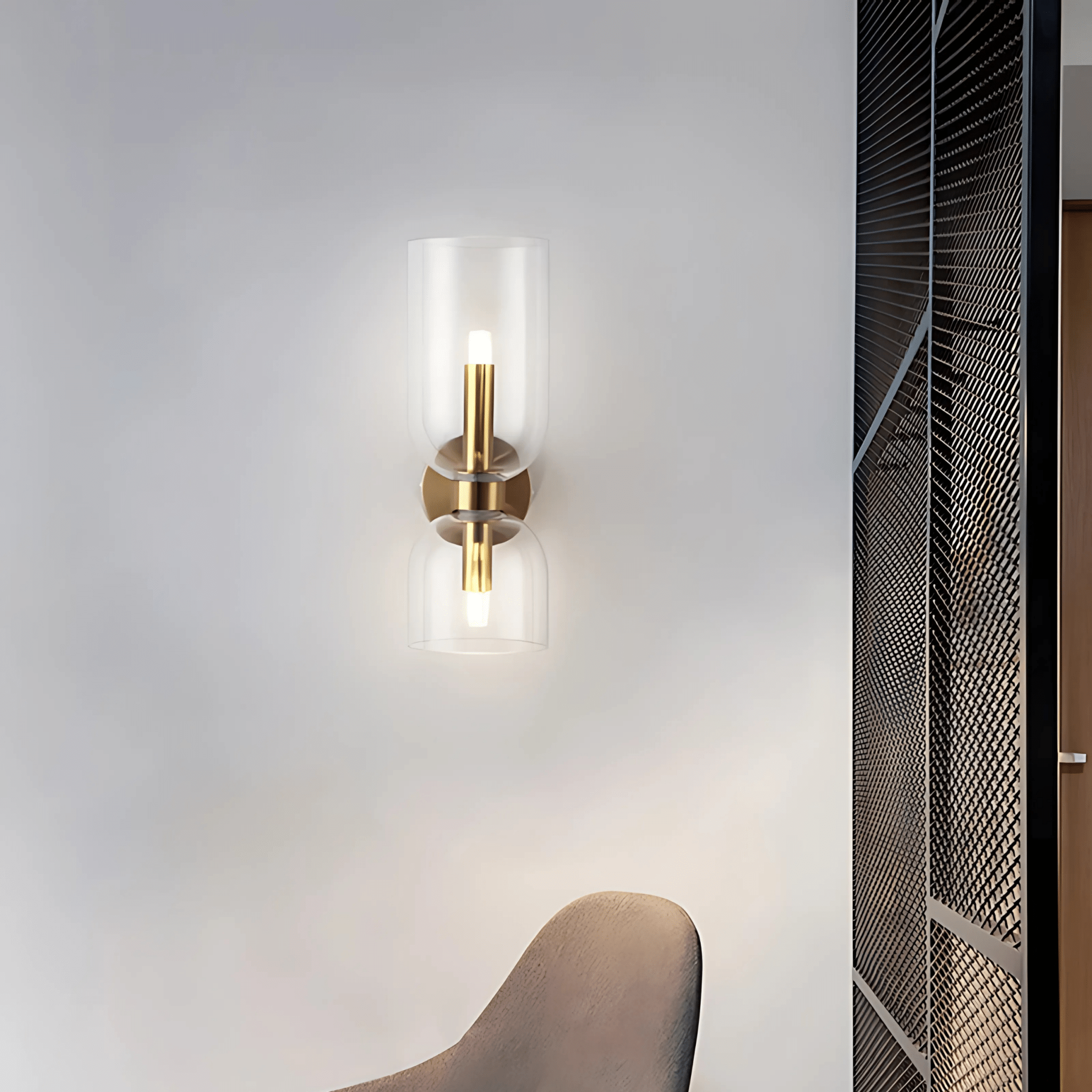 Clear Duetto Glass Wall Sconce glowing by a window