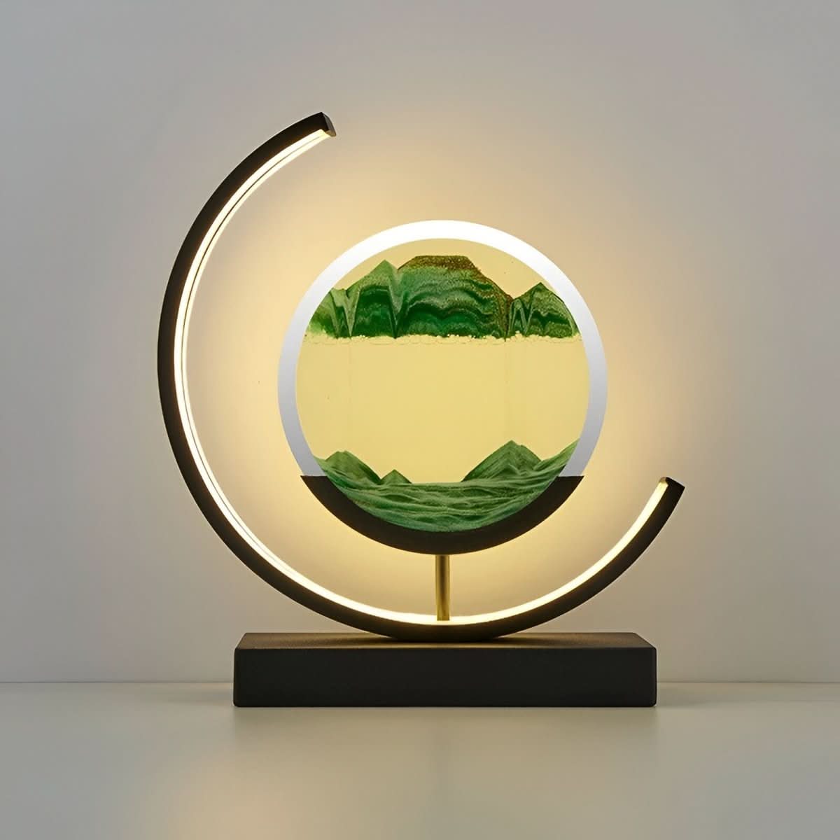 Green sand art lamp glowing, product view
