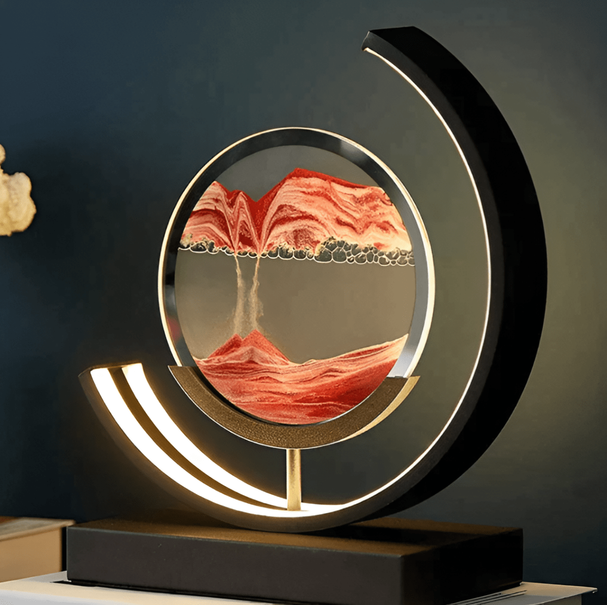 Red sand art lamp styled in an elegant interior