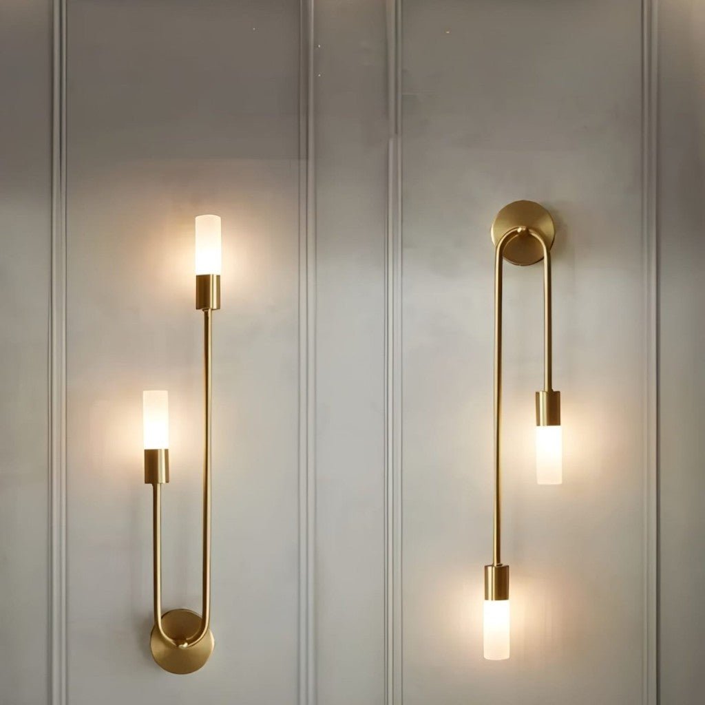 https://cdn.shopify.com/s/files/1/0655/0464/1076/files/gold-wall-sconce-with-double-frosted-glass-cylinders_8.jpg?v=1773242837