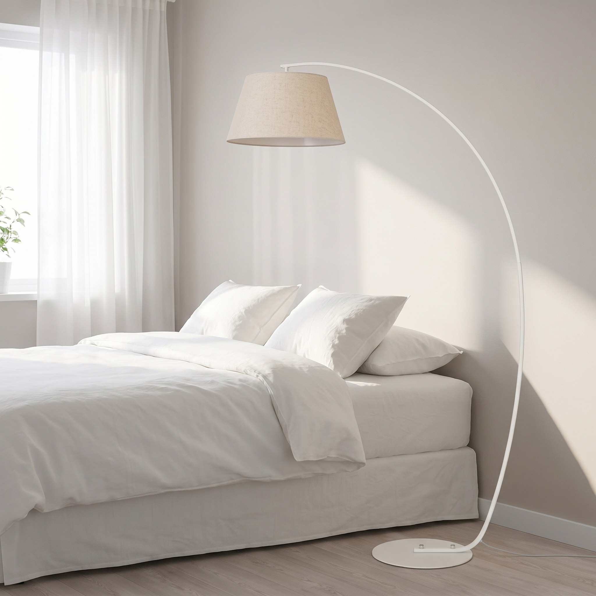 Lume Sereno Adjustable Arm Floor Lamp in white in a minimalist bedroom