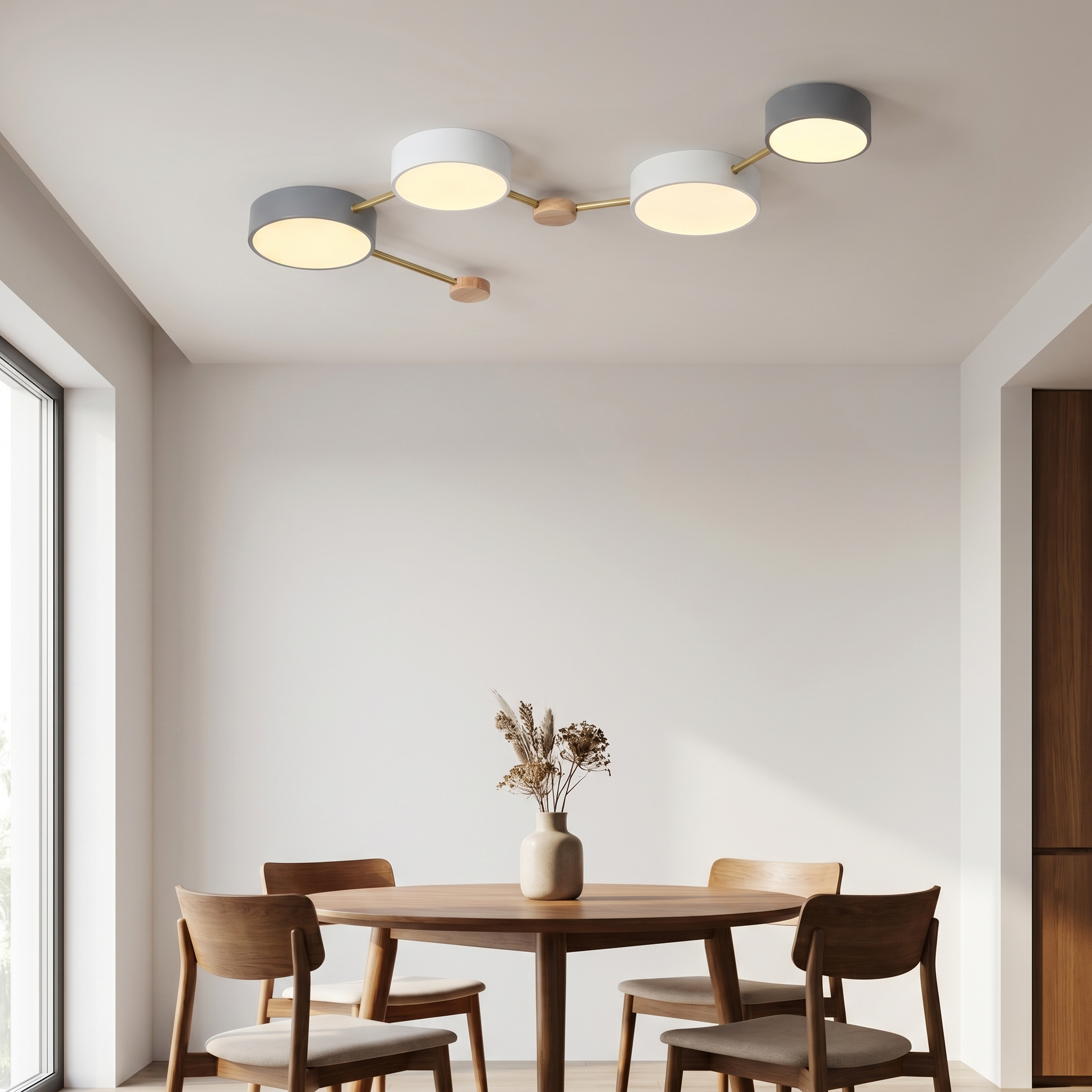 Costellazione Nordica flush mount light above a modern dining table